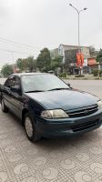 Xe Ford Laser Deluxe 1.6 MT