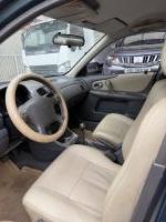 Xe Ford Laser Deluxe 1.6 MT